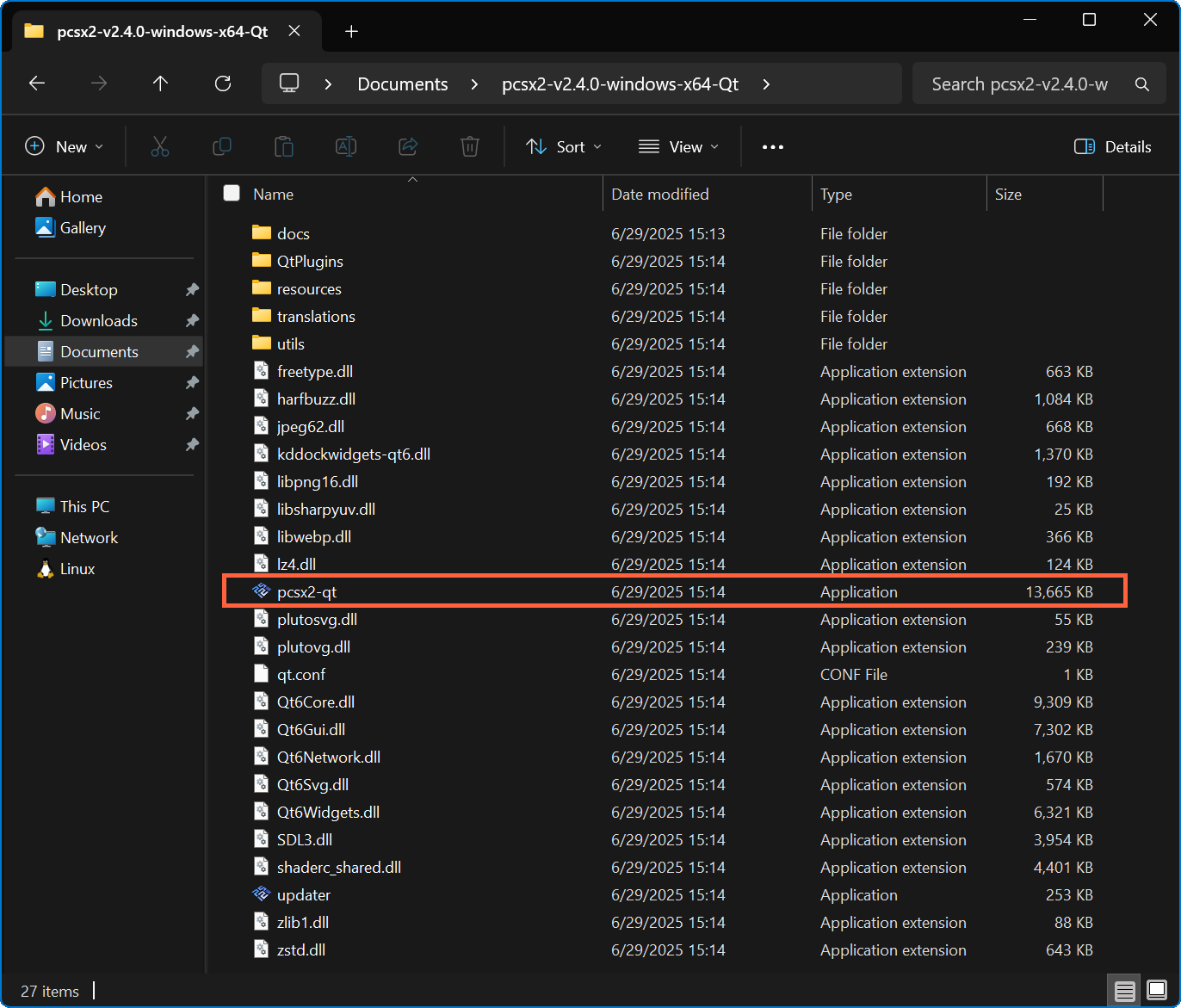 Windows File Explorer opened to the extracted contents of a PCSX2 download. The application file named pcsx2-qt is highlighted.